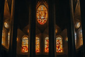 Intricate stained glass windows inside Sagrada Familia, Barcelona.