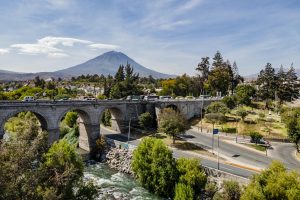 Aerial view of Puente Grau with El Misti in the background, Arequipa, Peru.