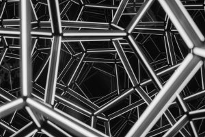 Intricate black and white geometric structure showcasing modern abstract design.