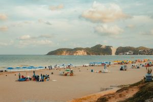 Breathtaking view of Ponta Negra Beach with distant Morro do Careca in Natal, Brazil. Perfect summer getaway.