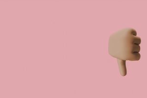3D thumbs down gesture with a pink background providing ample copy space.
