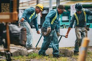 Team of construction workers collaborating on a project in San José, Costa Rica.