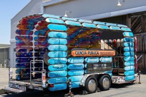 Creative skateboard trailer art installation in an urban setting.