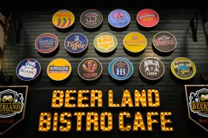 Colorful beer brand signs at Beer Land Bistro Cafe, Nagoya, Japan.