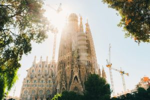 Majestic view of La Sagrada Familia under the bright sun, Barcelona.