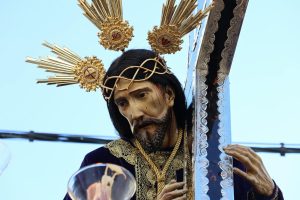 Sacred art depicting Jesus in Semana Santa procession, Spain.