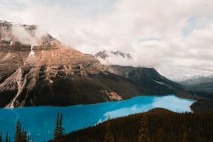A breathtaking view of Peyto Lake with surrounding mountains in the Canadian Rockies, Alberta.