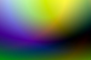 A dynamic and colorful gradient background blending green, purple, and yellow hues.